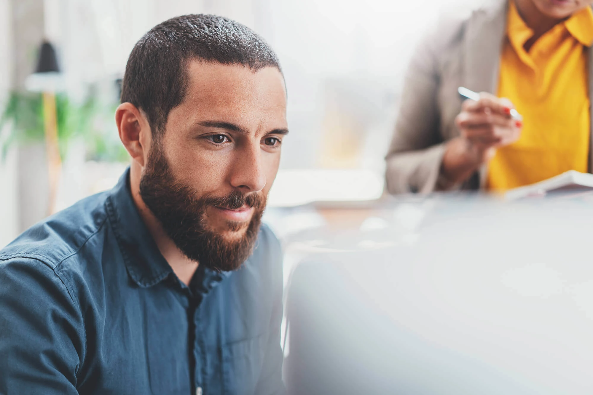 Man looking at a screen