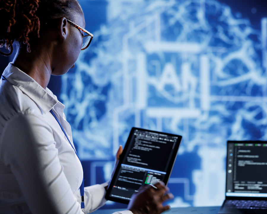 Woman on tablet in front of AI symbol