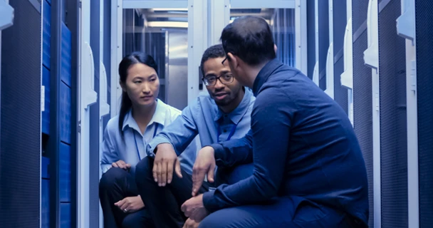 3 colleagues in server room