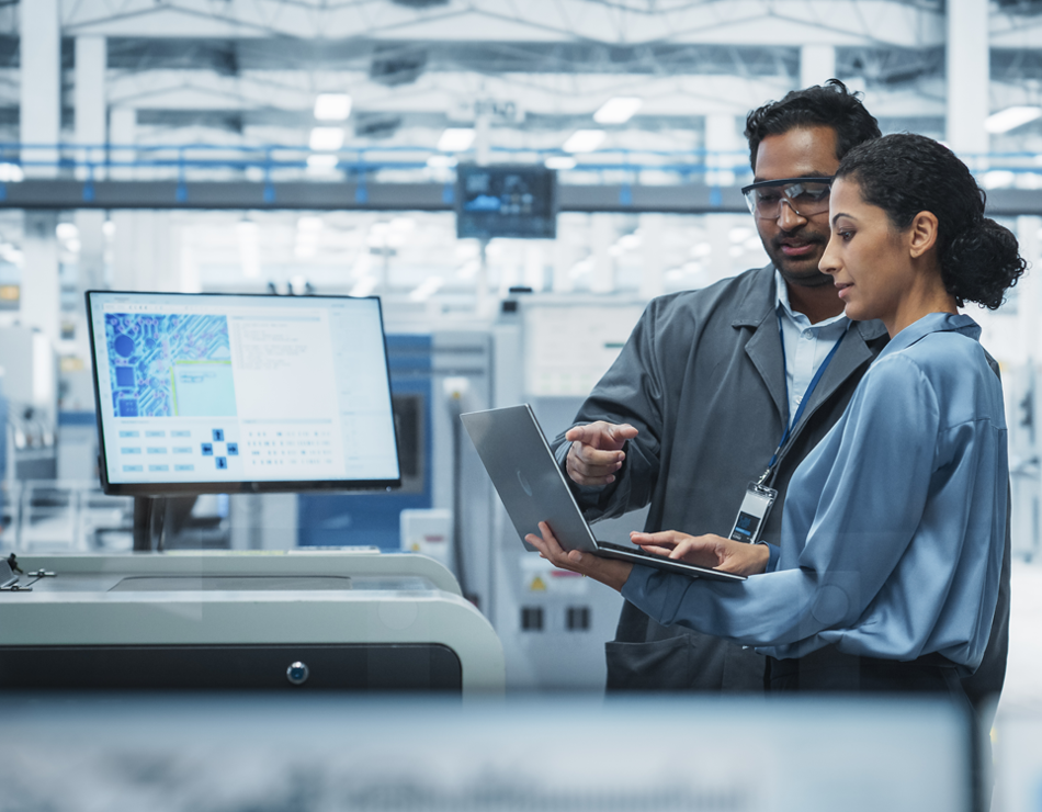 Man and woman on laptop in lab