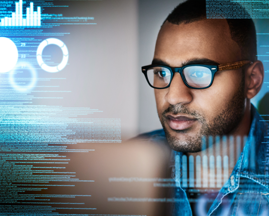 Man looking at computer with glasses
