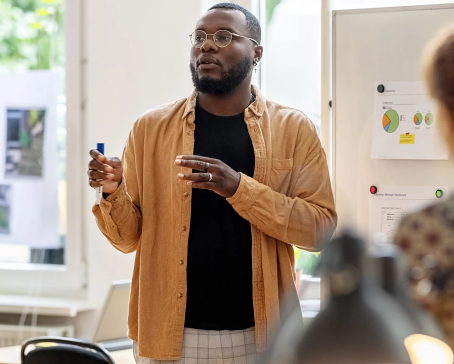 Man addressing colleagues