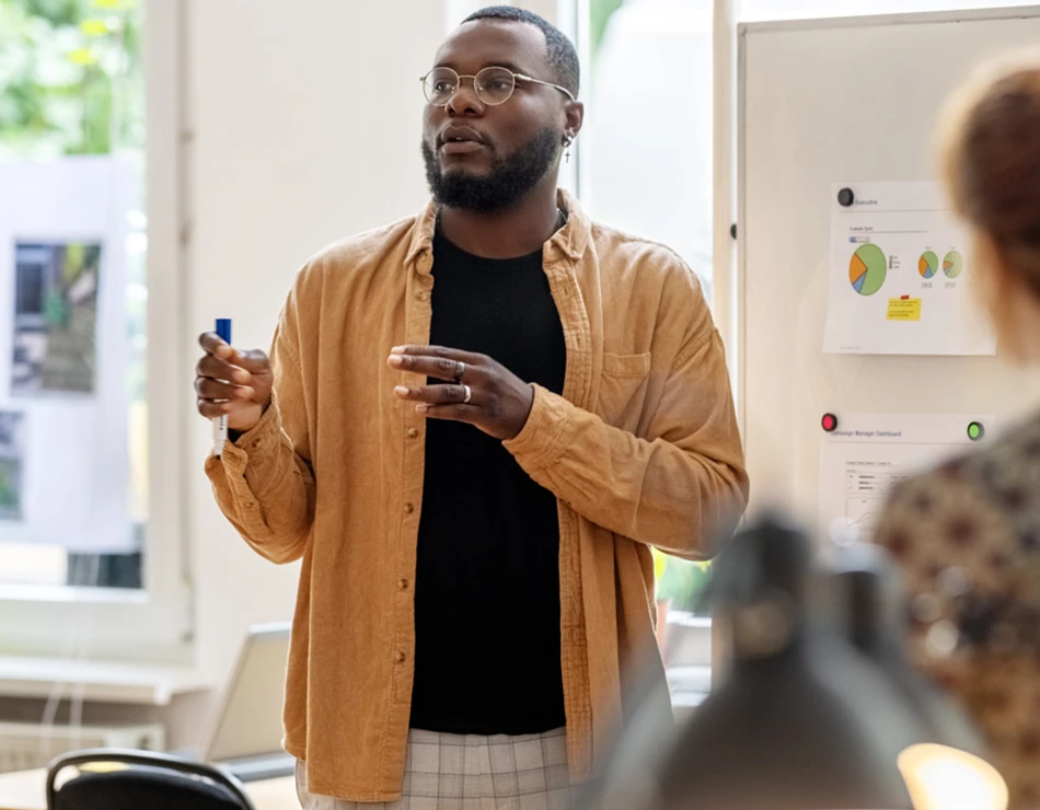 Man addressing colleagues