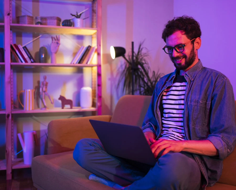 Man on laptop at home
