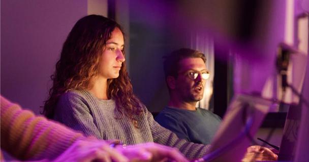 Colleagues on computers