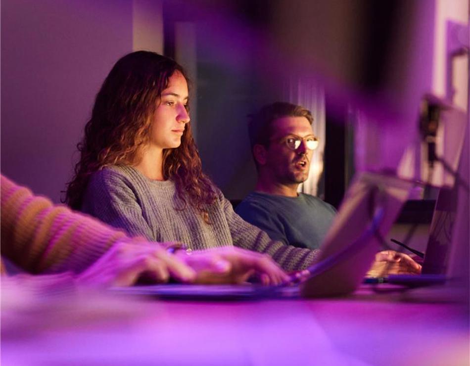 Colleagues on computers