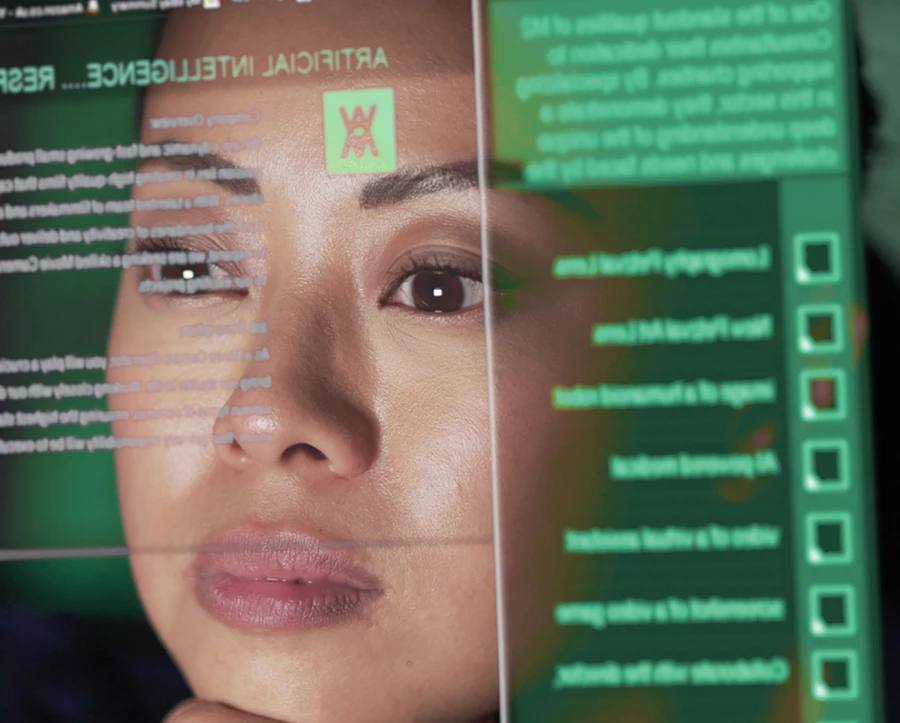 Image of a developer analysing data on a screen