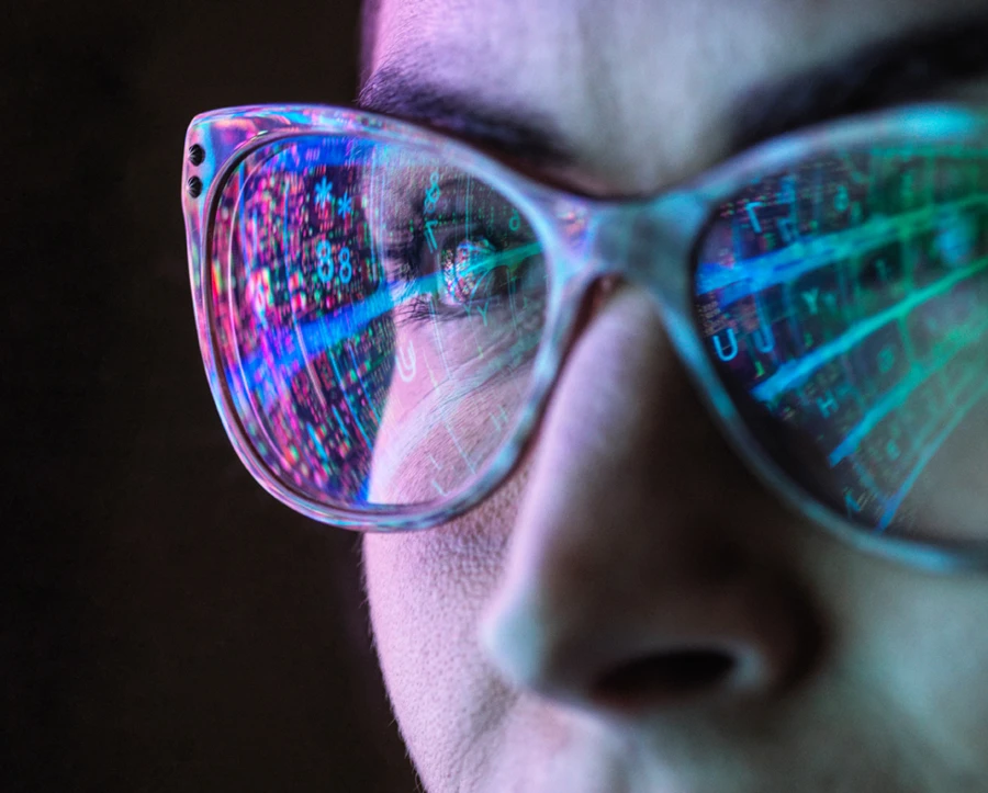 women wearing glasses reflecting code